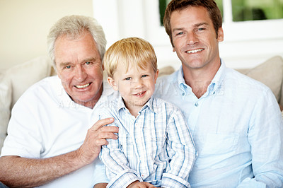 Buy stock photo Portrait, dad and grandpa with child on couch, happy and connection with grandchild and love in home. Family, generations and people with smile for kid, bonding and fathers day celebration in house