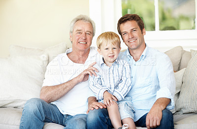 Buy stock photo Portrait, dad and grandpa with child in home, happy and connection with grandchild or love in lounge. Family, generations and people with smile for kid, bonding and fathers day celebration in house