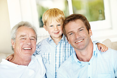 Buy stock photo Portrait, family and child at house with smile, love and bonding together with affection. Happy, father and grandfather embrace in lounge with kid, connection and visit for generations relationship