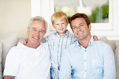 Buy stock photo Family, portrait and old man with child in lounge, generations or connection with grandchild on sofa. Senior dad, support and people with smile for kid, love and fathers day celebration in house