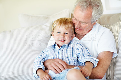 Buy stock photo Relax, happy and grandfather with boy on sofa for bonding, relationship and visit on weekend. Family, portrait and senior man with child on couch for connection, support or affection in home together