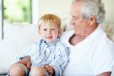 Buy stock photo Relax, happy and grandfather with child on sofa for bonding, relationship and visit on weekend. Family, portrait and senior man with boy on couch for connection, support or affection in home together