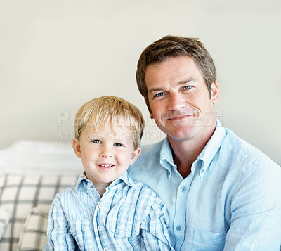 Buy stock photo Smile, portrait and dad with child in home for bonding, relationship and love for fathers day. Family, happy man and kid on couch for connection, support and relax together on weekend with space