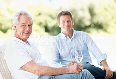 Buy stock photo Happy, wine and portrait of senior father for bonding, holiday and relax in backyard on weekend. Family, garden and man with elderly dad, alcohol and drinks for connection, relationship and vacation