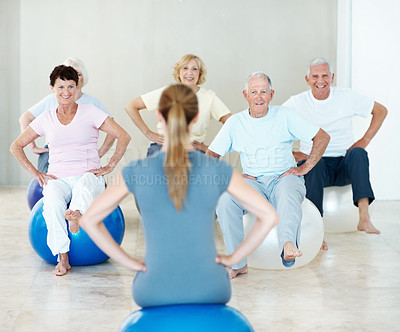 Buy stock photo Old people, stretching or instructor in yoga class, fitness or exercise together for peace in studio. Holistic healing, meditation or coach training for spiritual health, pilates or back for wellness