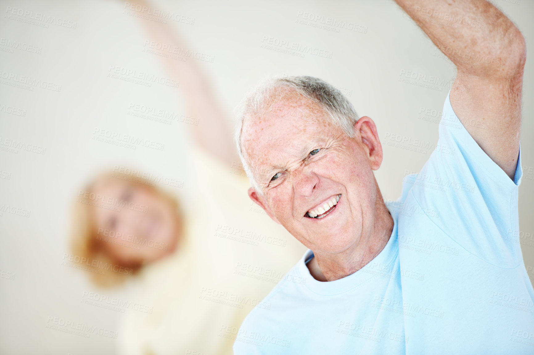 Buy stock photo Fitness, laughing and stretching with old man in pilates studio for activity, health or wellness. Exercise, funny and reaching with senior person in gym class for flexibility, mobility or training