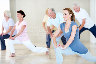 Buy stock photo Smile, instructor and stretching with old people for yoga, fitness and guide for retirement hobby. Happy, woman and senior group with warm up for wellness, yogi demonstration and mobility flexibility