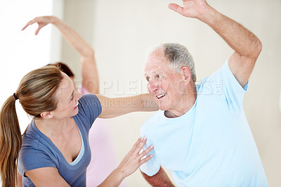 Buy stock photo Help, stretching and old man with instructor at fitness class, physical therapy and wellness. Health, trainer or happy people at studio with arm exercise, training support or assistance in retirement