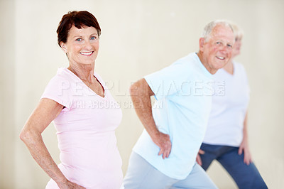 Buy stock photo Elderly people, portrait and stretching in gym class for exercise, preparation and wellness. Senior woman, instructor and group in health club with warm up, mobility workout or fitness for retirement