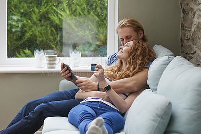 Buy stock photo Tablet, credit card and couple on sofa for online shopping, ecommerce or order on website in home. Happy, bonding and man with woman on digital technology with debit for internet banking with payment
