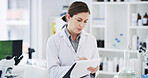 Woman, scientist and writing in lab with clipboard, medical research and document for investigation. Female person, paperwork and reading for biology with drug trial, experiment or forensic project
