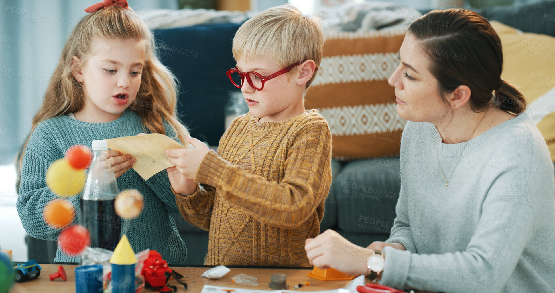 Buy stock photo Reading, mom or children with toys in home, assembly support or guidance for learning activity. Problem solving, woman or siblings with instructions for building set, interactive puzzle or bonding