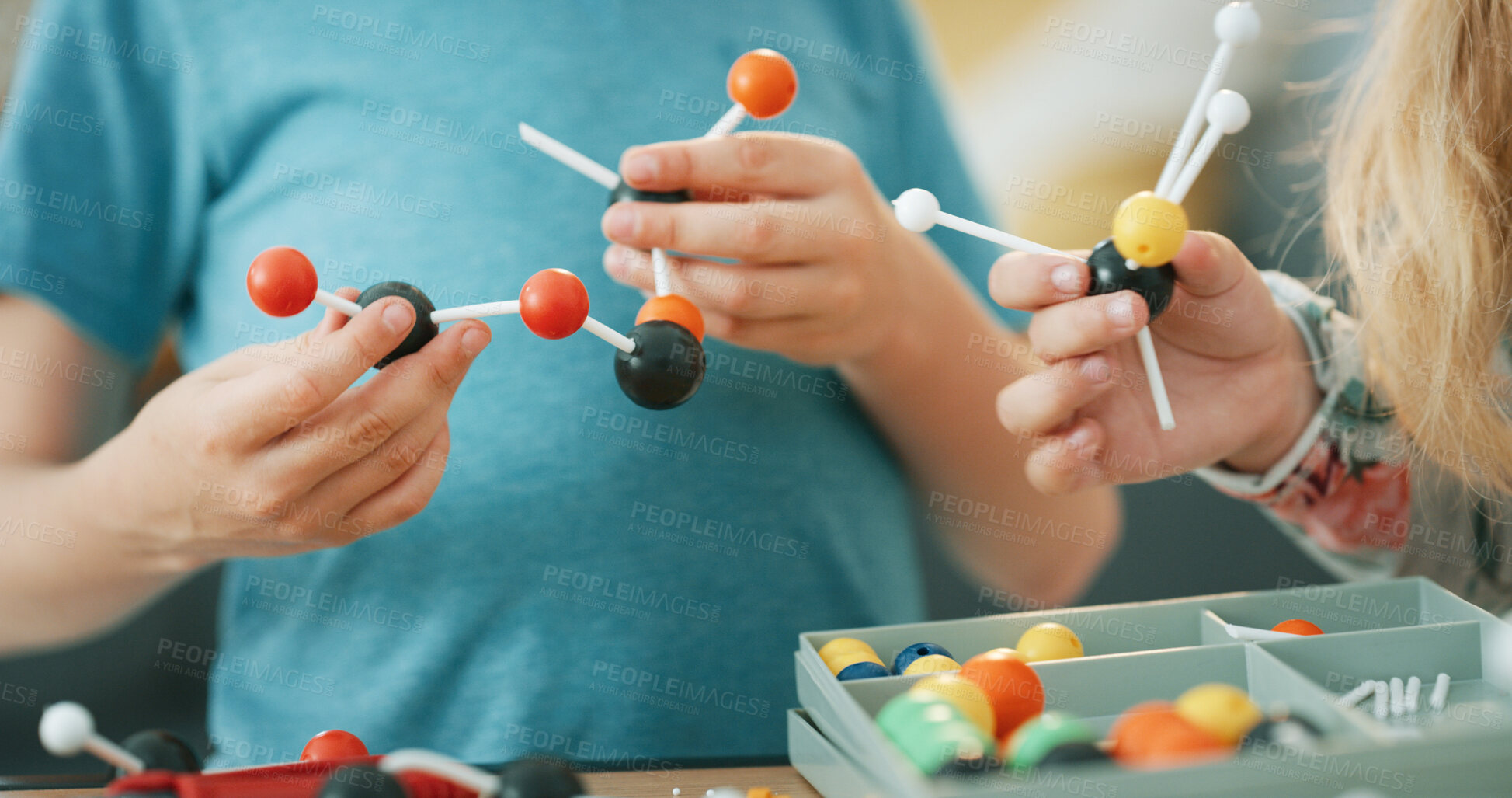 Buy stock photo Hands, science and children with atom model for project, discovery or assignment. Learning, toy and siblings with inspection of molecule, particle or element for school homework in house