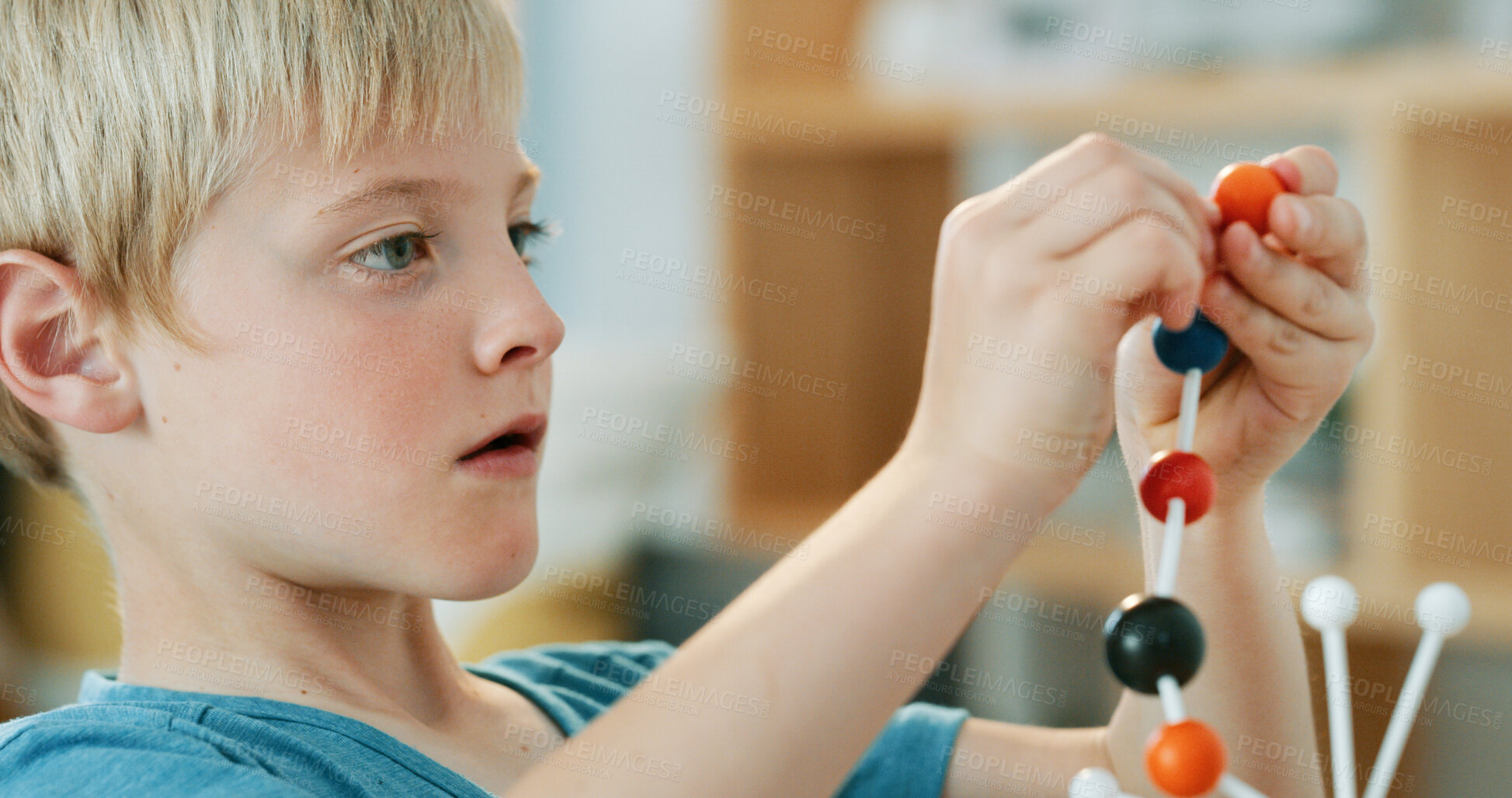 Buy stock photo Study, science and kid with atom model for project, education or assignment in house. Learn, student and boy child with inspection of molecule, particle or element for school homework in apartment.
