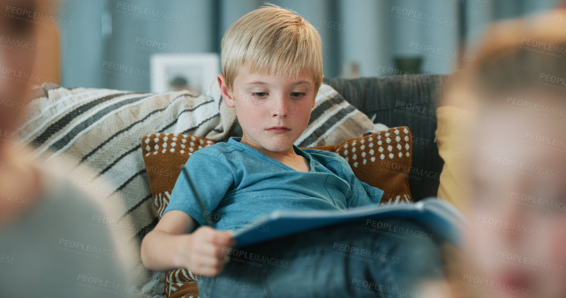 Buy stock photo Child, learning and reading book in living room with knowledge, literature and language development. Boy, hobby and creative storytelling in family home for education, growth and study literacy.