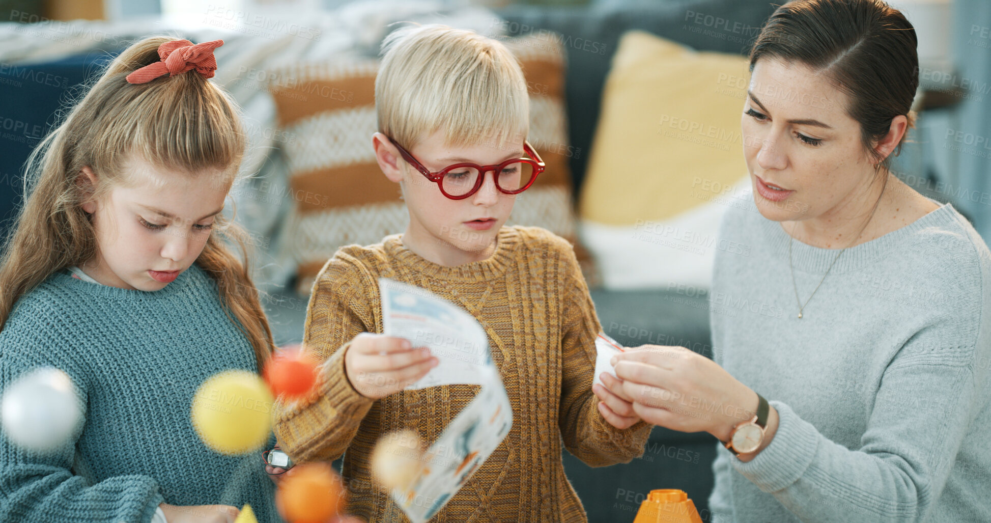 Buy stock photo Reading, paper and mother with children in home, project assistance and support for school activity. Teamwork, woman and kids with task instructions for assignment, help and guidance for development