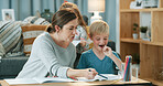 Mother, notebook and kid at house for education, learning and helping with school assessment. Woman, talking and child in home with book, academic guidance and studying notes for elearning assignment