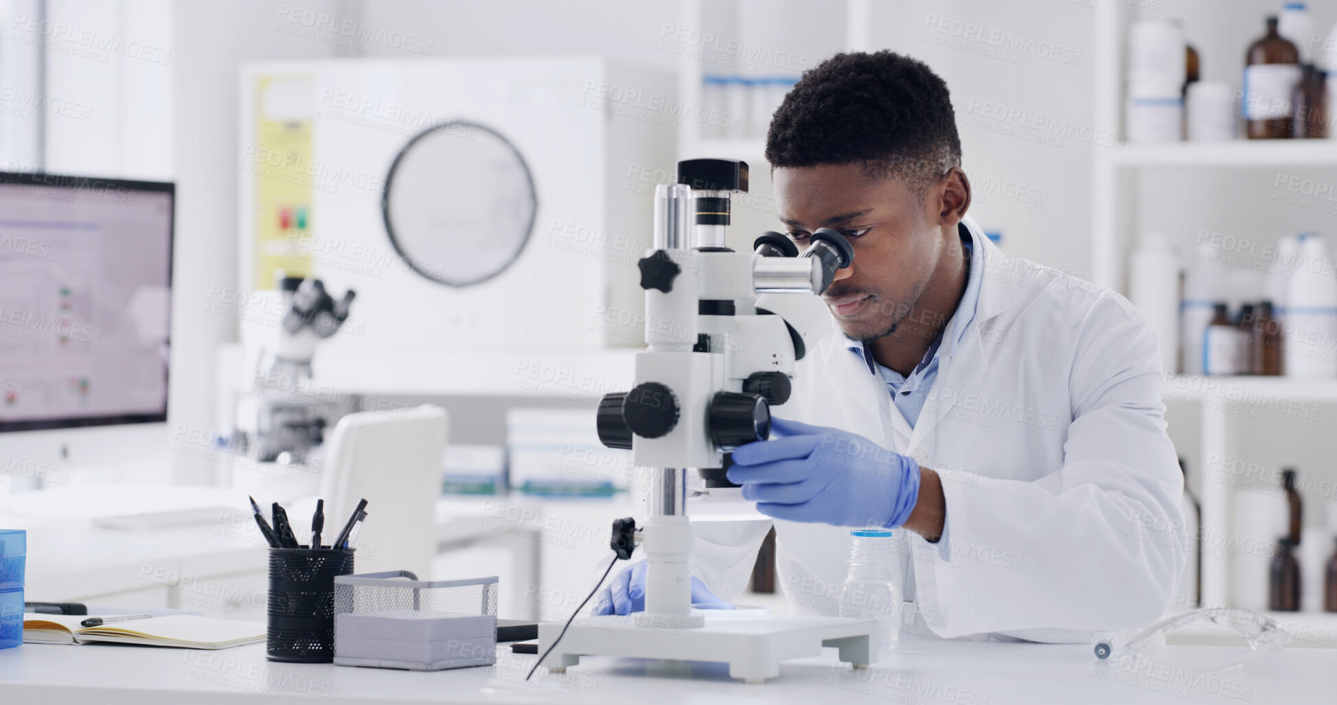 Buy stock photo Scientist, microscope and exam with black man in lab for forensic research or medical study. Male person, microbiologist or inspection with biotechnology for science, test results or clinical trial