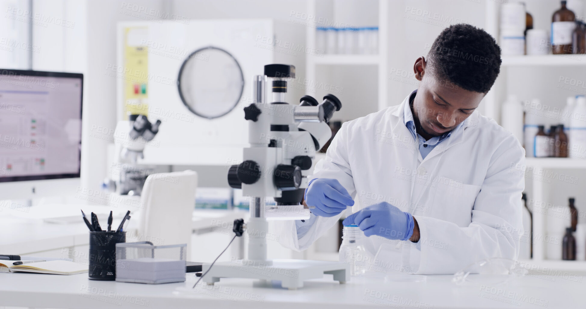 Buy stock photo Sample, black man and scientist in laboratory with medical research for innovation on microscope. Glass, person and chemist with liquid solution for pharmaceutical development with clinic results.