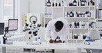 Science, man or writing in notebook in lab for clinical trial results, vaccine development or study. Scientist, black person or pharmacology notes for drug innovation, medical research or information
