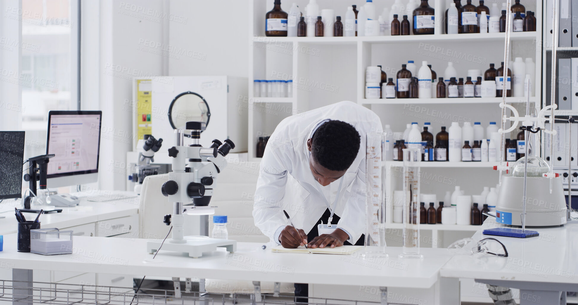 Buy stock photo Science, man or writing in notebook in lab for clinical trial results, vaccine development or study. Scientist, black person or pharmacology notes for drug innovation, medical research or information