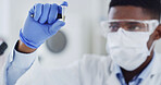 Black man, scientist and tube in lab with sample, research and experiment for medical study. Male person, face mask or inspection with safety gear for chemical analysis, fluid collection and solution