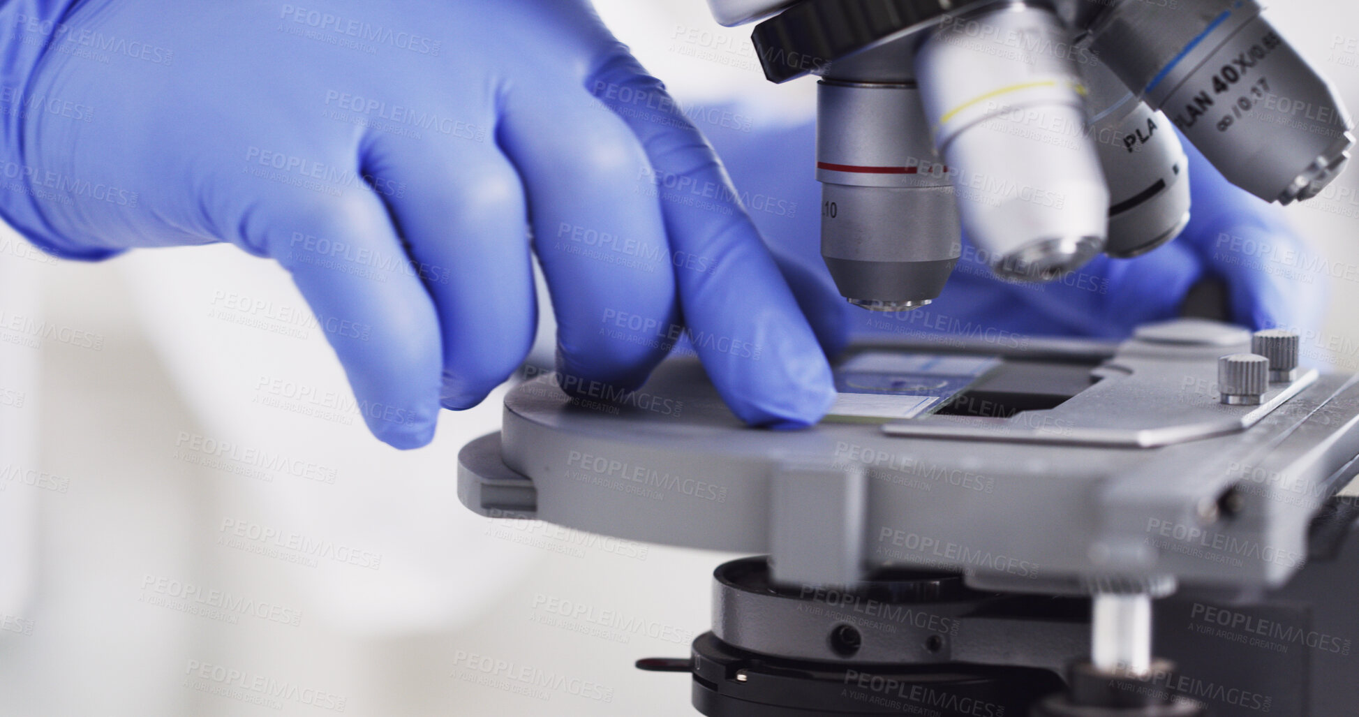 Buy stock photo Hands, microscope and dna with science for virus cure, review or medical research for healthcare innovation. Person, equipment and film for bacteria, particle or pharma study for vaccine development