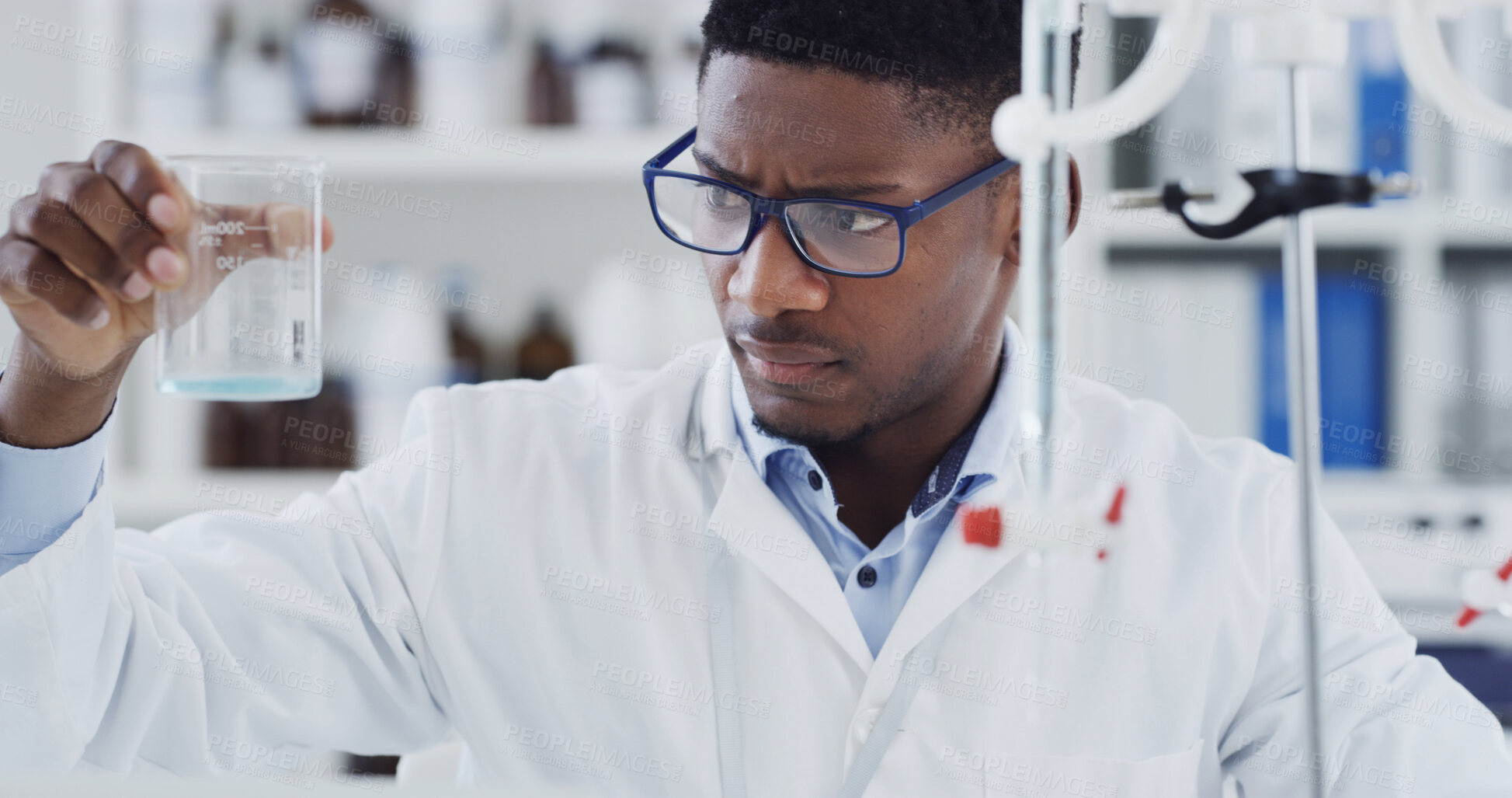 Buy stock photo Sample, black man and scientist with beaker in laboratory with medical research for innovation. Glass vial, person and chemist with liquid solution for pharmaceutical development with clinic results.
