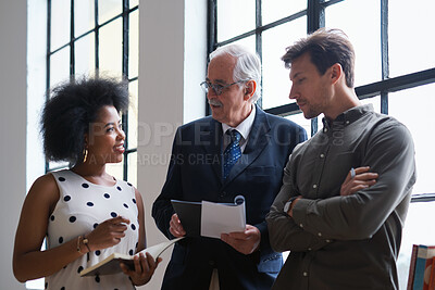 Buy stock photo Paperwork, team and business people in office for advice, asset management or expense report. Accounting, document and meeting at work for financial strategy, tax compliance or help with notebook