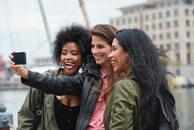 Buy stock photo Happy, selfie and friends outdoor for travel, photography and social media post on holiday. Smile, women and bonding at harbor for profile picture update, getaway reunion and memory on vacation trip