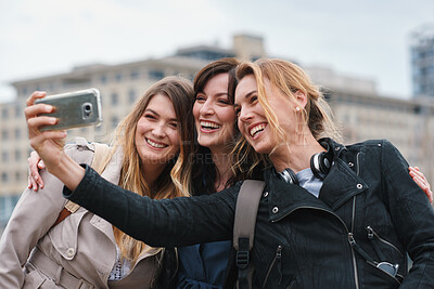 Buy stock photo Smile, selfie and friends in city for travel, photography and social media post on holiday. Happy, women and bonding outdoor for profile picture update, getaway gathering and memory on vacation trip