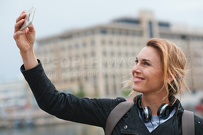 Buy stock photo Travel, selfie or woman in town with smile, holiday memory or outdoor post on weekend break. Happy, digital or person in city with picture, social media update or sightseeing capture on tourist trip