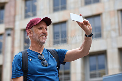 Buy stock photo Travel man taking photo using smartphone camera in city tourist sightseeing photographing with mobile phone