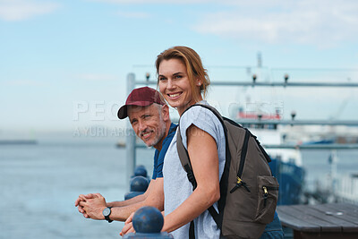Buy stock photo Couple, travel and view in harbor for holiday, date and smile for summer sightseeing or bonding. Mature man, woman and tourist with trip, vacation and together for honeymoon or romance on waterfront