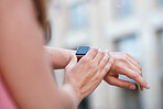 Woman hands using smart watch checking messages wearable mobile technology 