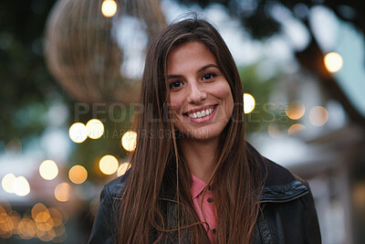 Buy stock photo Night, portrait and woman with travel for festival, holiday experience and abroad for weekend getaway. Bokeh, evening attraction and person with smile for tourism, overseas vacation and local event
