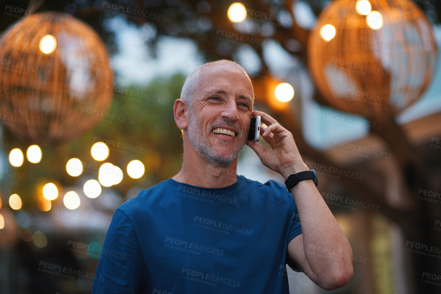 Buy stock photo Phone call, night and man in city, smile and digital app for communication, internet and funny. Outdoor, evening and mature person with discussion, online chatting and talking to contact and laughing