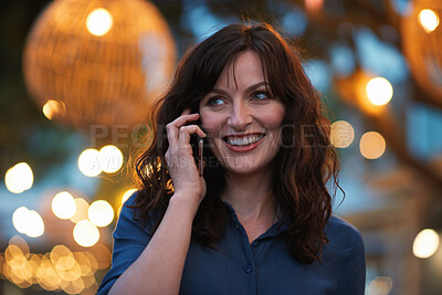 Buy stock photo Travel, phone call and woman in city, laughing and happy with funny chat on weekend or communication. Evening, outdoor and person with mobile for discussion, bokeh and listening to joke with tech