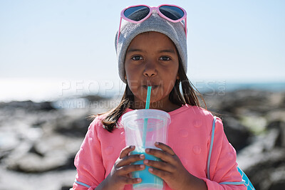 Buy stock photo Fashion, outdoor and girl with milkshake for portrait, winter style and travel holiday trip for thirst. Drink, nature and child with smoothie for hydration, break and stylish accessories for vacation