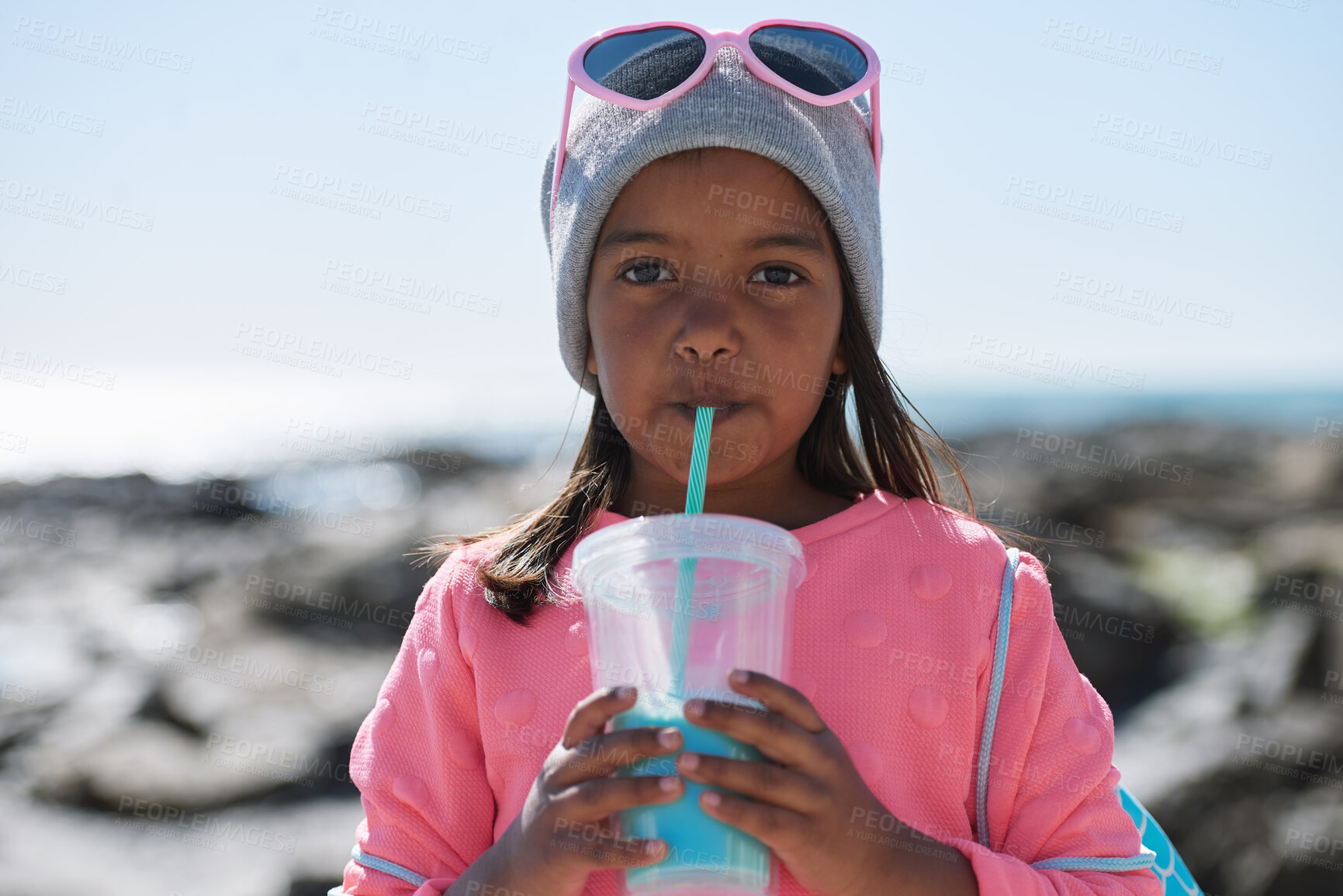 Buy stock photo Fashion, outdoor and girl with milkshake for portrait, winter style and travel holiday trip for thirst. Drink, nature and child with smoothie for hydration, break and stylish accessories for vacation