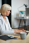 Young business Woman working at laptop in office studio