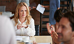 Beautiful blonde businesswoman at meeting in office