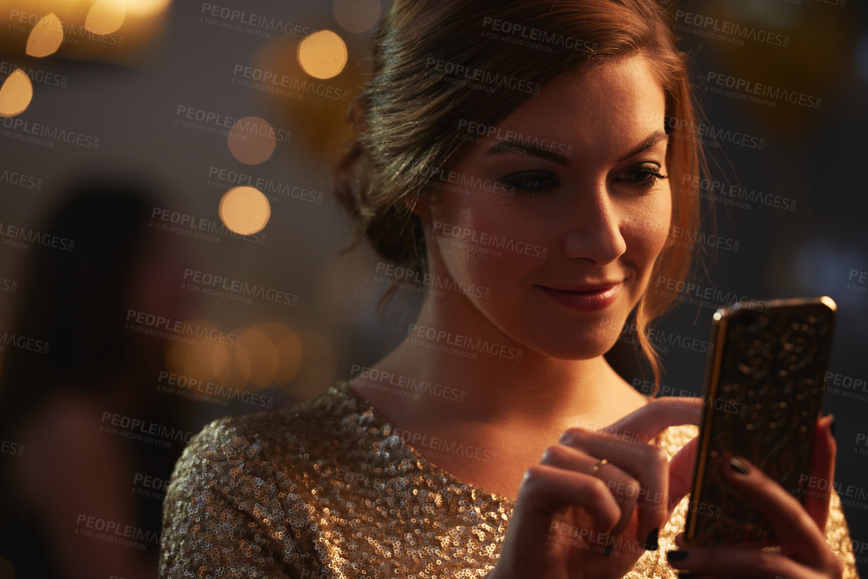 Buy stock photo Phone, scroll and woman at party or nightclub with social media update, celebration or text message. Mobile, smile or person at new year gathering, online connection or check post with bokeh at event