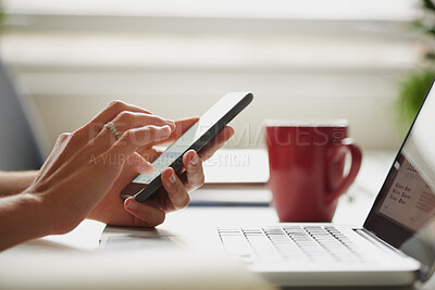 Buy stock photo Hands, laptop and phone for freelance work with person at desk in home as small business employee. App, coffee and computer with remote worker in apartment for communication, planning or research