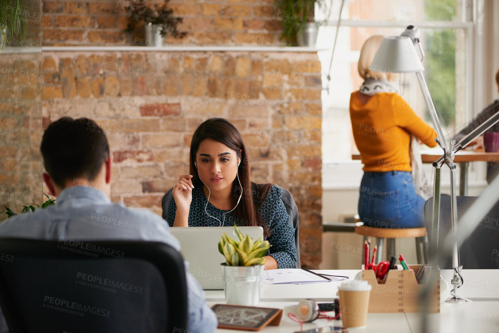 Buy stock photo Research, earphones or woman with laptop in startup, streaming music or monitor campaign traction. Creative, coworking or marketer with tech for engagement report, ads planning or listening to song