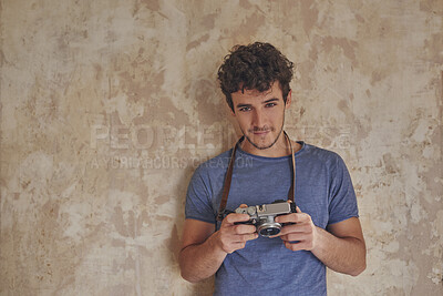 Buy stock photo Man, photographer and portrait with camera for photoshoot, production hobby and capture picture in home. Tech, male person and space with vintage equipment for photography, memory or content creation
