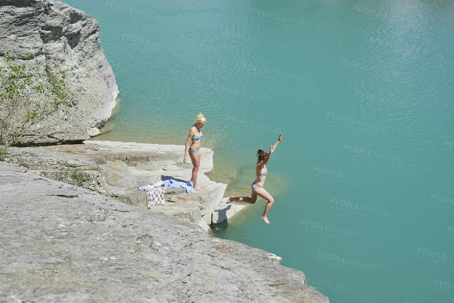 Buy stock photo Travel, jump or friends at lake with swim, good time and bonding together on summer break. Sunshine, space or women at river with water fun, hangout activity or vacation connection in outdoor getaway