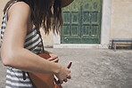 Tourist girl relax using smart phone to connect on adventure travel