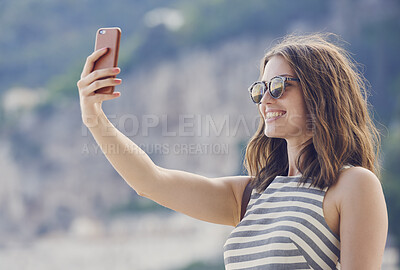 Buy stock photo beautiful fashionable woman taking selfie smiling using smart phone technology at hotel on luxury vacation