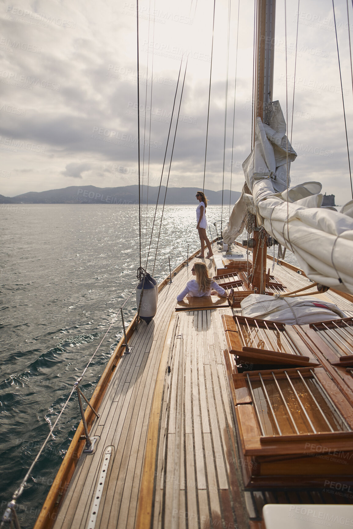 Buy stock photo Travel, view and ocean with friends on yacht for summer vacation, seaside getaway and peace. Holiday cruise, bonding and sailing with women on boat for tropical journey, tourism and relax together
